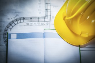 Building helmet notepad on blueprint
