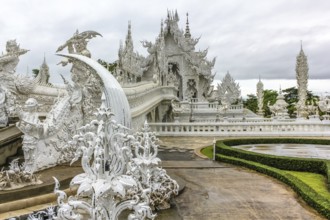 The spectacular Wat Rong Khun called White Temple during the rainy season, Chiang Rai, Northern
