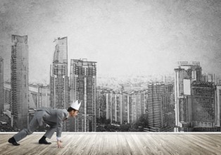 King businessman in elegant suit running and drawn cityscape silhouette at background
