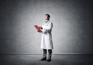 Portrait of the Doctor. Holds a tablet with documents in his hands and makes notes