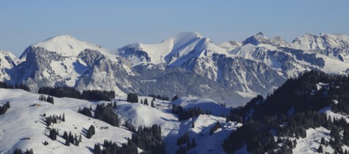 Snow covered mountain ranges seen from Horeneggli