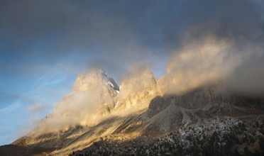 Foggy mountain landscape of the picturesque Dolomiti at Passo Sella area in South Tyrol in Italy