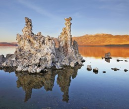 The magic of Mono Lake. Outliers - bizarre limestone formations reflected in the smooth water.