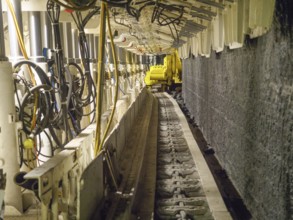 Industrial machine with conveyor belt in a tunnel, Bochum, North Rhine-Westphalia, Germany, Europe