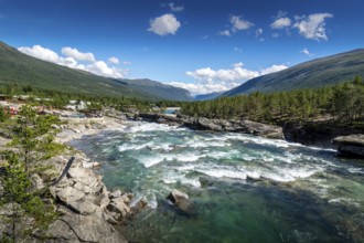 Rapids on a big river in the middle of Norway at summertime. A wild river in the middle of Norway