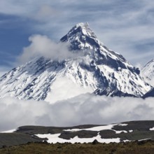 Beautiful mountain landscape of Kamchatka Peninsula: scenery view on steep slope cone of Kamen