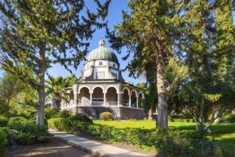 Blooming huge park around the monastery. The Lake Tiberias. Church of the Beatitudes. The church is