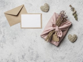 Zero waste Valentine's Day concept and mock up. Eco-friendly gift cloth wrapping in Furoshiki