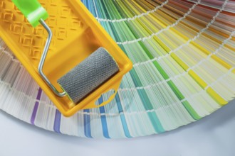 Paint roller tray color palette on white background