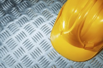 Hard hat on corrugated metal sheet