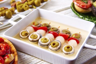 Olives anchovies and picked onion red pepper pinchos tapas from Spain