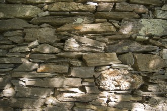 Old stone wall made with the technique of dry masonry