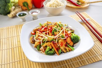 Sweet and sour chicken with rice and vegetables