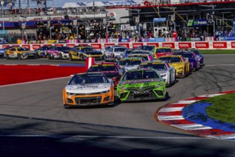 NASCAR Cup Series driver, AJ ALLMENDINGER (16), races through the turns during the Bank of Amercia