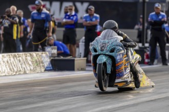 Sep 22, 2023-Concord, NC: NHRA Pro Stock Motorcycles Series driver, Jerry Savoie, runs down the