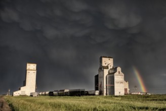 Prairie Grain Elevator in Saskatchewan Canada with storm clouds
