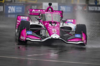 INDYCAR Series driver, HELIO CASTRONEVES (06) of Sao Paulo, Brazil, travels through the turns
