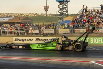 NHRA driver, Leah Pruett, prepares to qualify for the Dodge Power Brokers NHRA Mile-High Nationals