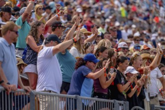 Fans watch all the race action during the Hy-Vee INDYCAR Race Weekend at the Iowa Speedway in