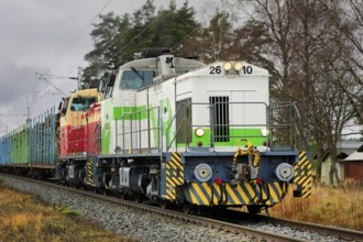 VR freight train with two diesel locomotives, Dv12 No. 2610 in the front pulling carriages full of