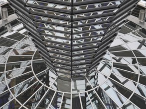 Reflections in glass and metal in the dome of the Reichstag. Berlin, Germany, Europe