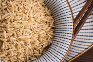 Raw brown rice in a bowl