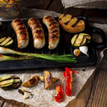Delicious grilled sausage with various grilled vegetables