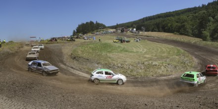 Car racing, autocross, race track of the RSG Aartal, panoramic race track, cars in the bend, blue