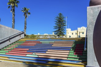 Multi-colored picturesque staircase descends to the port. Cape Town is a fabulous port city on the