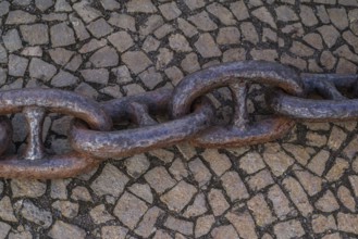 Old, rusty harbour chain