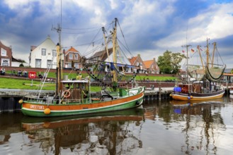Traditional shrimp boats in the harbour of Greetsiel, East Frisia, Germany, Europe