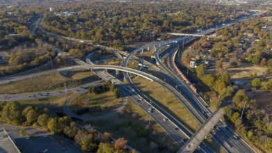 Aerial view of a major highway with rush hour traffic
