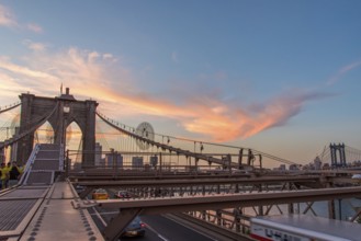 Night coming over famous Brooklyn Bridge, New York City, USA, North America