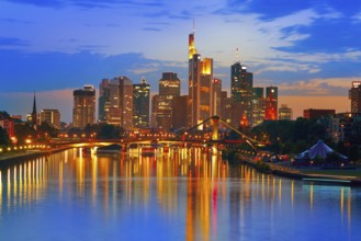 Frankfurt skyline at sunset in Germany with Meno river