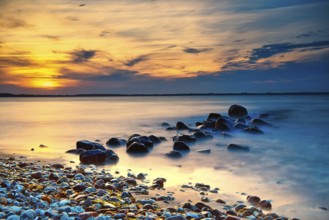 Sunset on the beach of Niendorf on the baltic sea