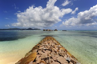 Breakwater in front of the harbour of La Passe, La Digue Island, the Seychelles, Indian Ocean