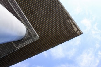 View up the pillar to the top of the roof
