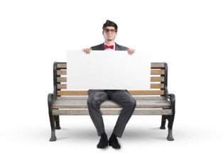 Young businessman holds a large white banner. sits on the bench
