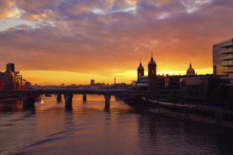 London sunset at Thames with St Paul Pauls Cathedral of England
