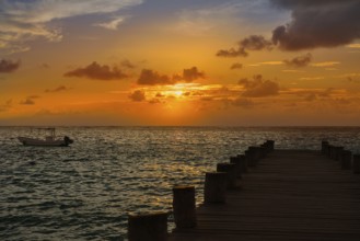 Riviera Maya pier sunrise in Caribbean Mayan Mexico