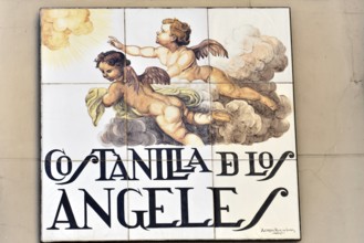 Madrid, Spain, Europe, An artistically painted street sign on a wall shows the Costanilla de los