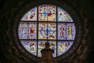 SIENA, ITALY, SEPTEMBER 23, 2023, Rich ornate window with mother mary above the presbytery of the