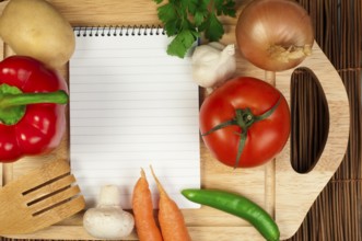 Notebook to write recipes and vegetables around it