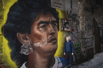 NAPLES, ITALY - JANUARY 14, 2024: Graffiti image of legendary FC Neapoli and Argentine national