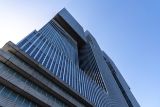 Rotterdam, Netherlands, May 8, 2022: De Rotterdam Skyscraper against sky. Designed by Rem Koolhaas