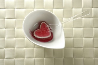Eat a jelly strawberry bloody heart romantic metaphor