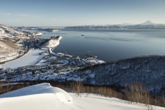 Beautiful winter Kamchatka landscape: top panoramic view of the Petropavlovsk-Kamchatsky City,