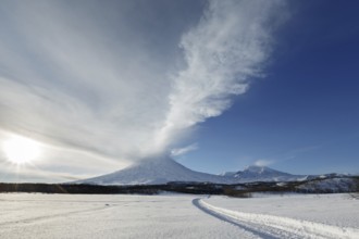 Beautiful volcanic landscape of Kamchatka Peninsula: wintry view of eruption active Klyuchevskoy