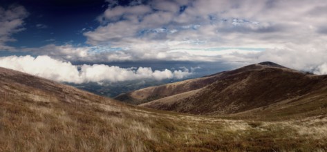 Beautiful blue sky and dry grass in Carpathian mountains. Borzhava range