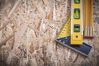 Square ruler construction level wooden meter on OSB